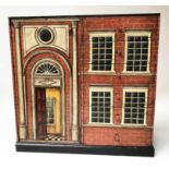 DOLLS HOUSE CHEST, with six short drawers flanked by cupboard painted as a Georgian townhouse,