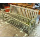 GARDEN BENCH, weathered teak with a slatted back and seat, 180cm L x 92cm H x 65cm D.