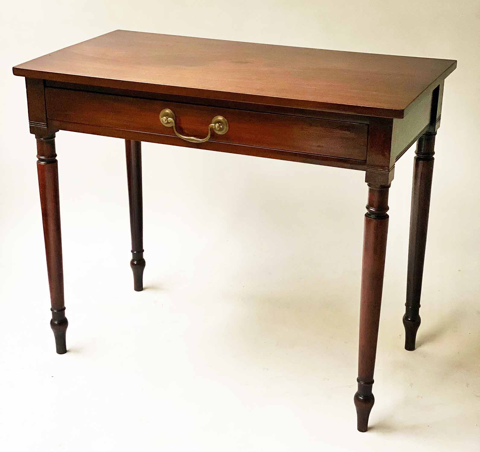 WRITING TABLE, George III figured mahogany with full width frieze drawer, 85cm x 43cm x 73cm H.