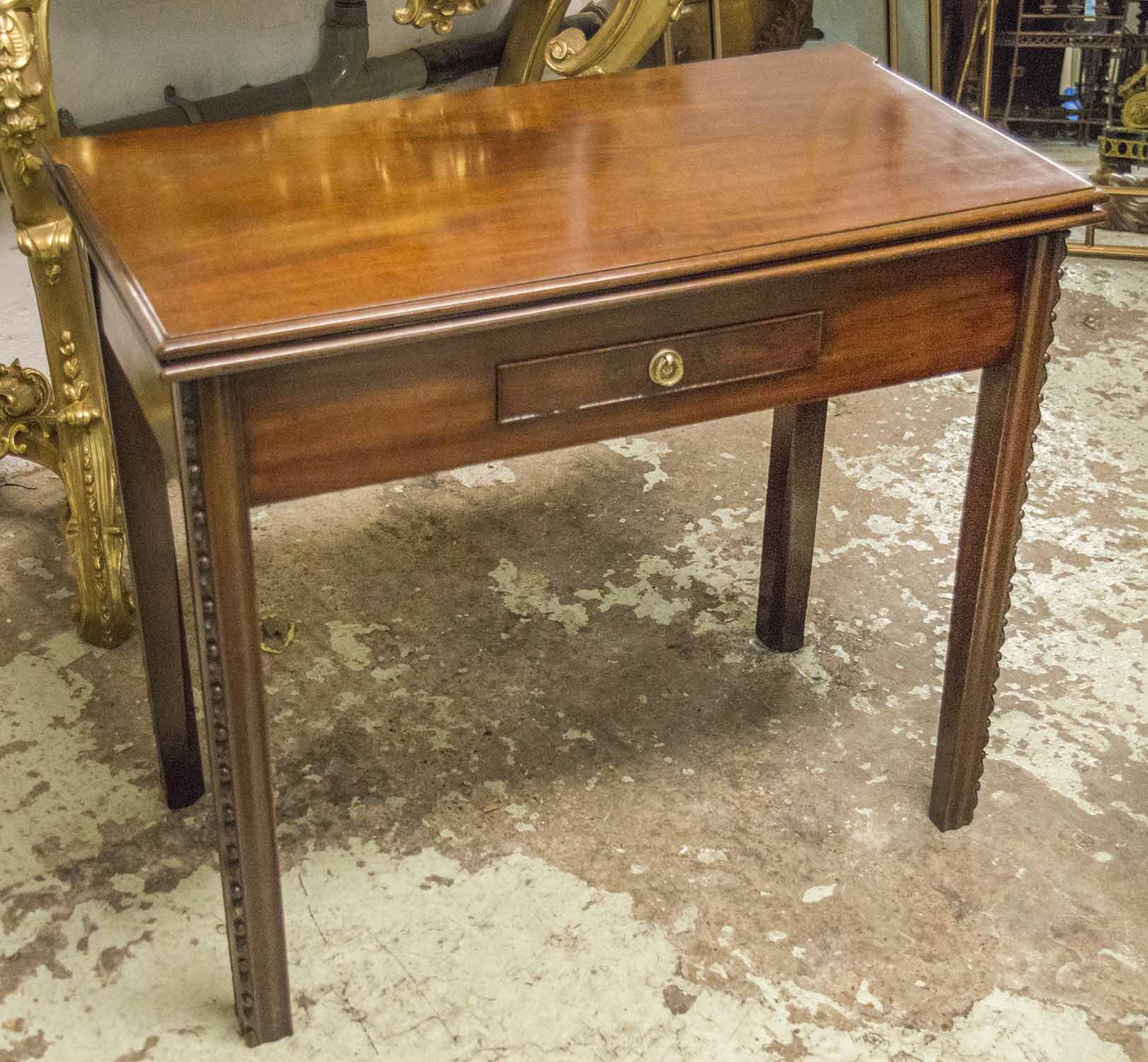 TEA TABLE, George III mahogany with foldover top and frieze drawer, 73cm H x 86cm W x 43cm D.