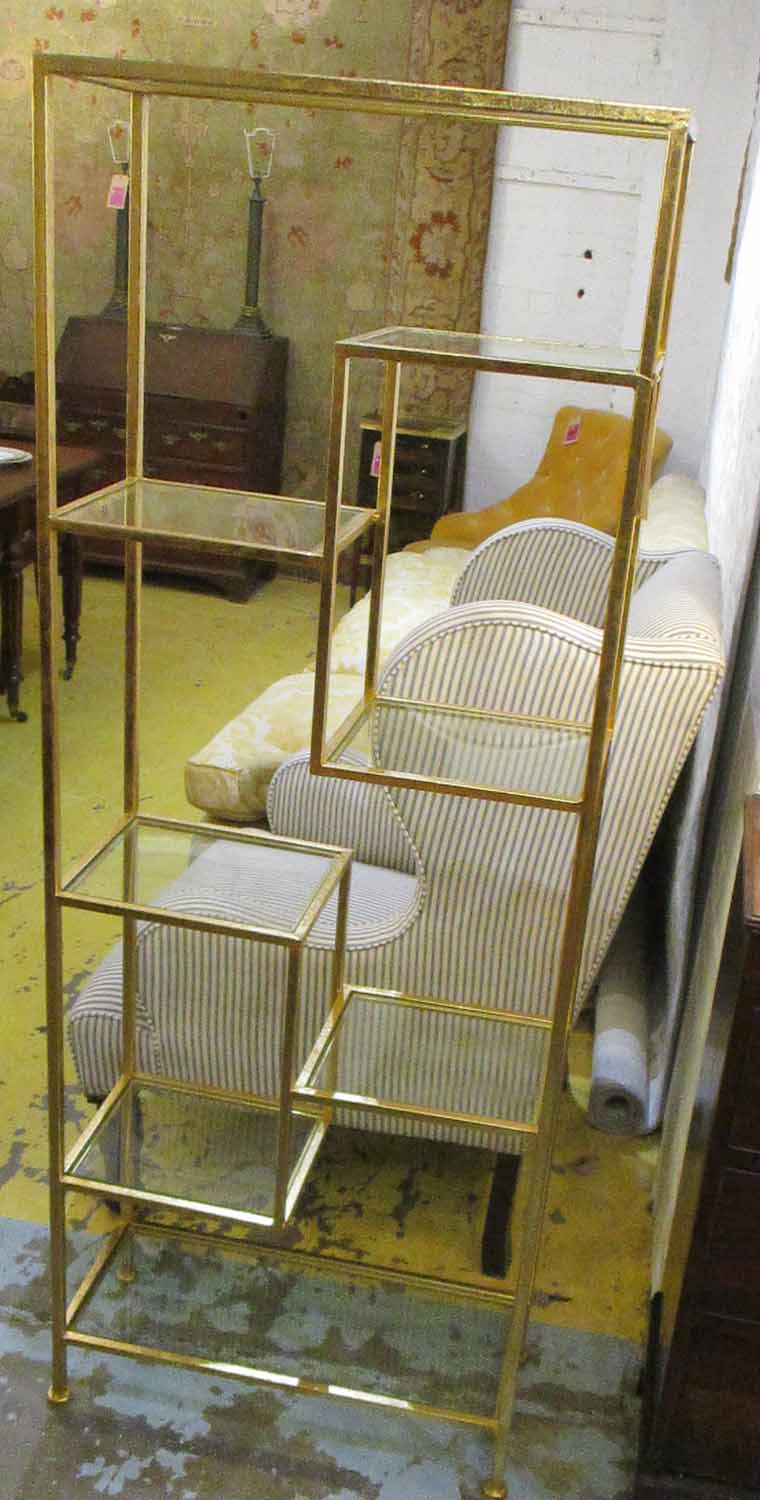 ETAGERE, gilt metal framed enclosing multiple glass shelves, 63cm W x 164cm H x 27cm D.