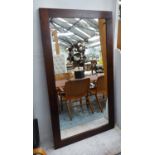 WALL MIRROR, of large proportions, contemporary stained wood frame, 169cm x 93cm.