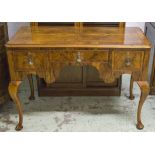 WRITING TABLE, early 20th century Queen Anne style walnut with three drawers,