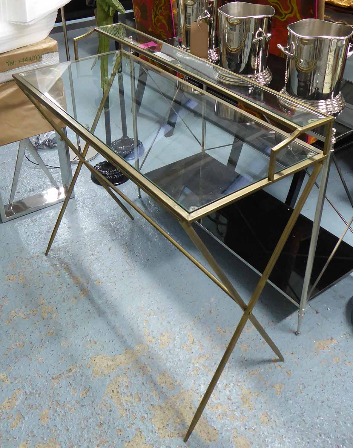 MAISON JANSEN INSPIRED DESK, gilt metal and glass, 95cm x 42cm x 89cm.