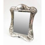 SILVER MOUNTED DRESSING MIRROR, Art Nouveau style with repoussé decoration of scrolling daffodils,