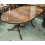 DINING TABLE, Regency style mahogany with crossbanding and two extra leaves,
