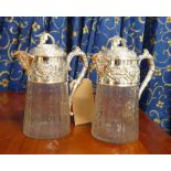 CLARET JUGS, a pair, 19th century style, with grape vine design, 28cm H.