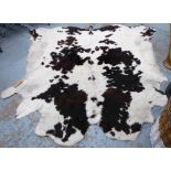 COWHIDE RUG.