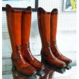 RIDING/WALKING STICK STANDS, two pairs, Country Estate boot design, stylised finish,