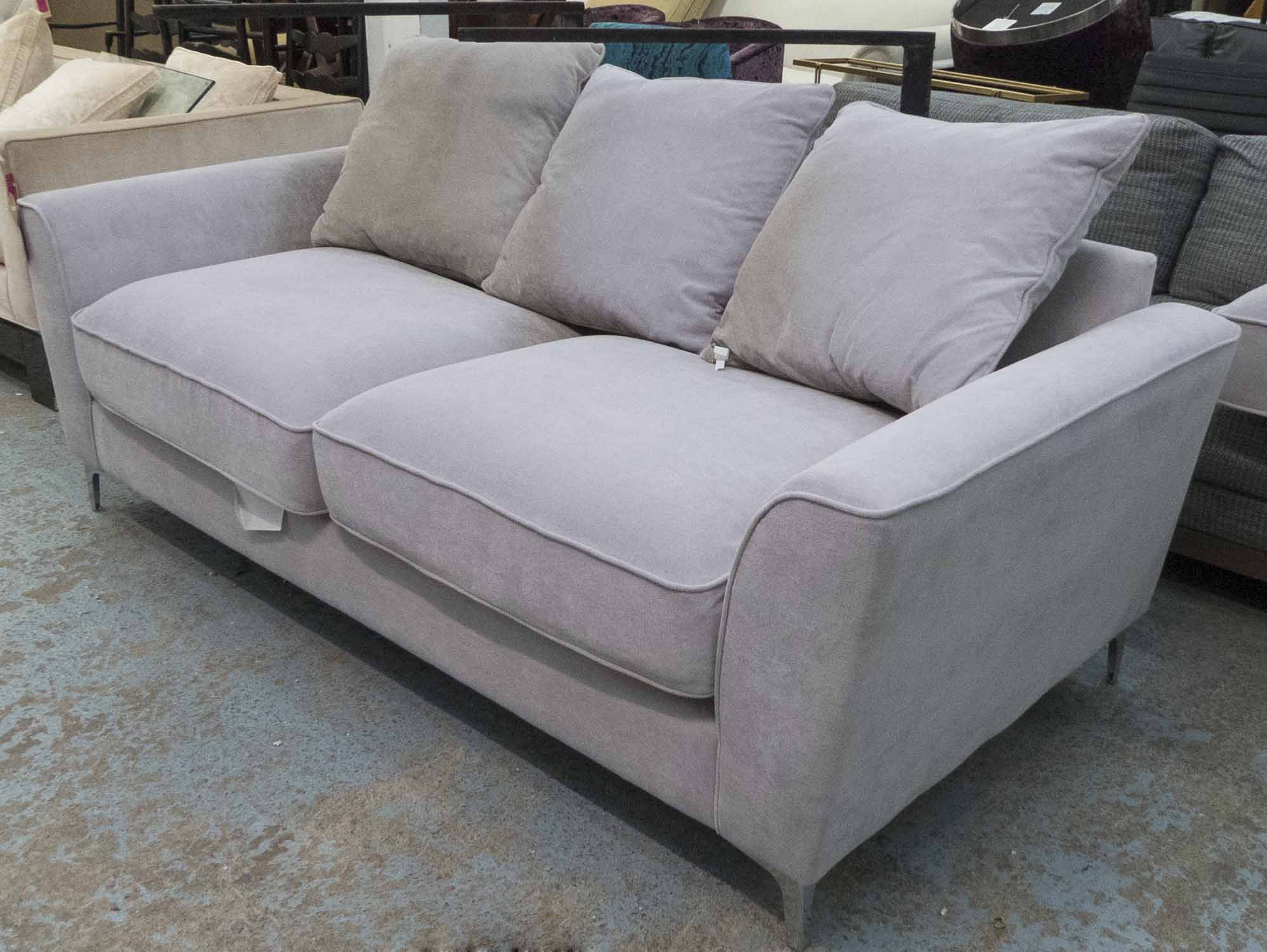 SOFA, two seater, in grey fabric on chromed metal supports plus three cushions,