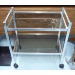 TROLLEY, vintage polished aluminium two tier with castors, 65cm x 39cm x 71cm H.