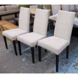 DINING CHAIRS, a set of twelve, ivory upholstery with square tapered supports, 96cm H x 47cm.