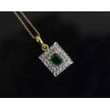 AN EMERALD AND DIAMOND PENDANT,