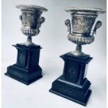 URNS, a pair,