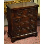 BACHELOR'S CHEST, Georgian style, yewwood with foldover top above four drawers,