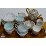TRAY CONTAINING 2 VARIOUS PART TEA SETS, ROYAL SUTHERLAND & FOREIGN