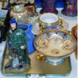 TRAY CONTAINING FIGURAL DECANTER, DECORATIVE COMPORT, BARNSTAPLE VASE, LIDDED JAR ETC