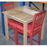 A MODERN KITCHEN TABLE WITH 2 CHAIRS