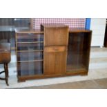 AN OAK GLASS FRONTED COMBINATION BUREAU BOOKCASE