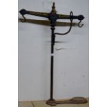 AN OLD CAST IRON BALANCE SCALE BY D. BRASH & SONS GLASGOW