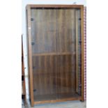 A MODERN DOUBLE GLAZED DOOR DISPLAY CABINET