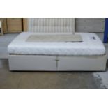 AN ELECTRIC ADJUSTABLE DOUBLE BED WITH HEADBOARD