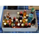 A BOX WITH ASSORTED WHISKY MINIATURES