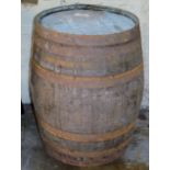 AN OLD WOODEN WHISKY BARREL