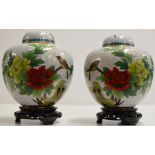 A PAIR OF 7" DECORATIVE CHINESE CLOISONNÉ LIDDED JARS WITH WOODEN STANDS