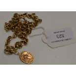 A 9 CARAT GOLD NECKLACE WITH A 9 CARAT GOLD ST CHRISTOPHER PENDANT - APPROXIMATE WEIGHT = 19 GRAMS