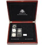 A PRESENTATION COIN CASE WITH PART SET OF 4 SILVER PROOF COINS