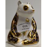 A ROYAL CROWN DERBY PORCELAIN PAPER WEIGHT MODELLED AS AN IMPERIAL PANDA