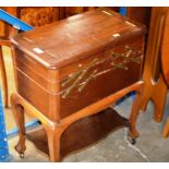 A MAHOGANY CANTILEVER SEWING TROLLEY