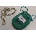 A TIFFANY & CO STERLING SILVER NECKLACE WITH BAG