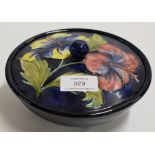 A 6½" DIAMETER MOORCROFT POTTERY LIDDED BOX