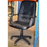 A MODERN SWIVEL OFFICE CHAIR