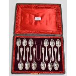 A CASED SET OF 12 EPNS ART NOUVEAU STYLE TEASPOONS WITH TONGS BY WALKER & HALL