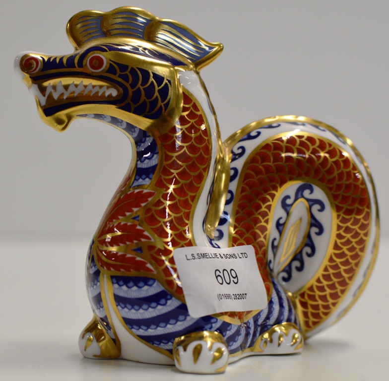 A ROYAL CROWN DERBY PORCELAIN PAPER WEIGHT MODELLED AS A CHINESE DRAGON