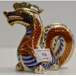 A ROYAL CROWN DERBY PORCELAIN PAPER WEIGHT MODELLED AS A CHINESE DRAGON