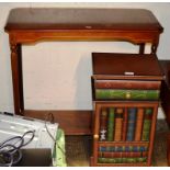 A CONSOLE TABLE & NOVELTY BOOK DESIGN CABINET
