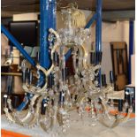 A REGENCY STYLE CHANDELIER OF APPROXIMATELY 30 LIGHTS