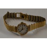 EVERITE 9 CARAT GOLD LADIES WRIST WATCH ON 9 CARAT GOLD BRACELET - APPROXIMATE WEIGHT = 17 GRAMS