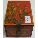 EARLY 20TH CENTURY CHINESE RED LACQUER PUZZLE BOX WITH THE TOP DECORATED WITH BIRDS AMID FLOWERING