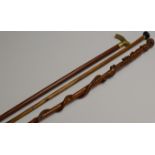 34½" OLD CARVED WOODEN WALKING STICK WITH THE HANDLE MODELLED AS A FEMALE FIGURE WITH OTHER