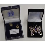 GAME OF THRONES SILVER AND AMETHYST BUTTERFLY BROOCH AND PAIR OF EARRINGS