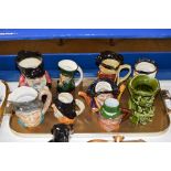 TRAY CONTAINING VARIOUS CHARACTER JUGS