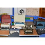 COLLECTION OF 7 VARIOUS VINTAGE TYPEWRITERS