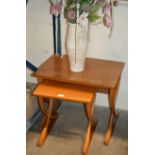 2 TEAK TEA TABLES & POTTERY VASE WITH ARTIFICIAL FLOWERS