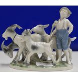 20TH CENTURY GERMAN PORCELAIN FIGURINE DISPLAY MODELLED AS A YOUNG BOY WITH GOATS, IN THE STYLE OF