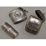 2 STERLING SILVER VESTA CASES, TOGETHER WITH A STERLING SILVER MATCH HOLDER